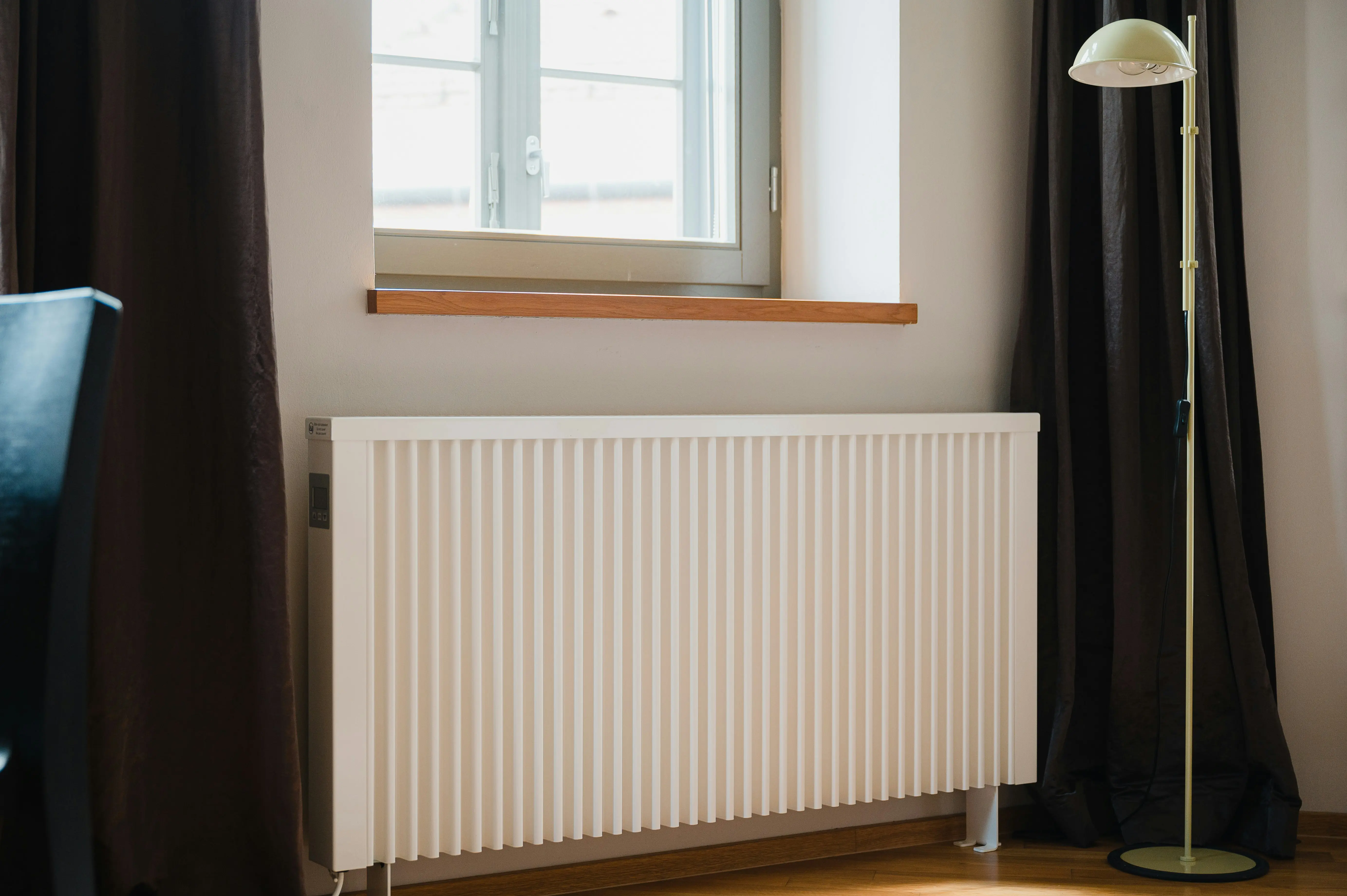 Installation radiateur chauffage central dans un logement à La Baule — SDR Plomberie