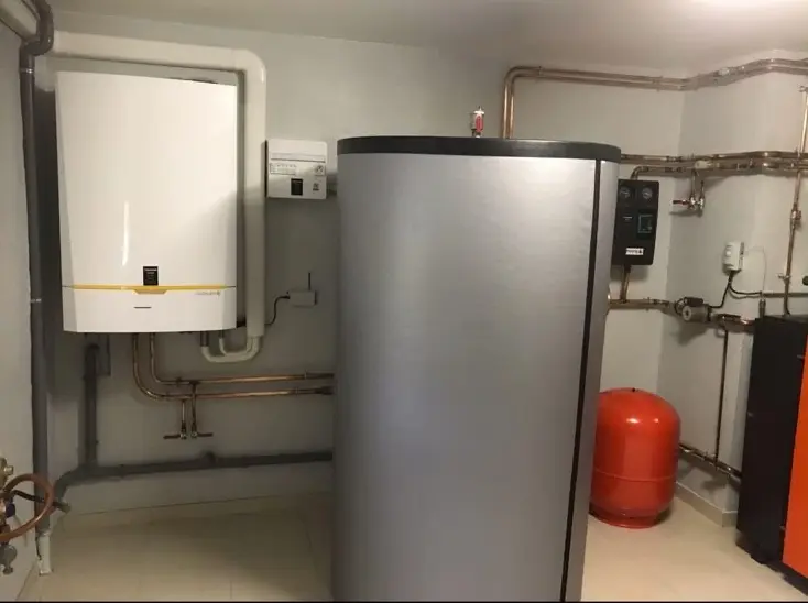 Installation chaudière et ballon tampon en local technique — SDR Plomberie La Baule