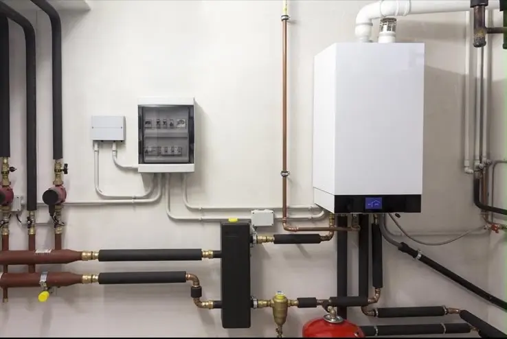 Installation chaudière et réseau tuyauterie en local technique — SDR Plomberie La Baule